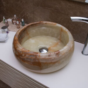 Lavandino rotondo in pietra di onice